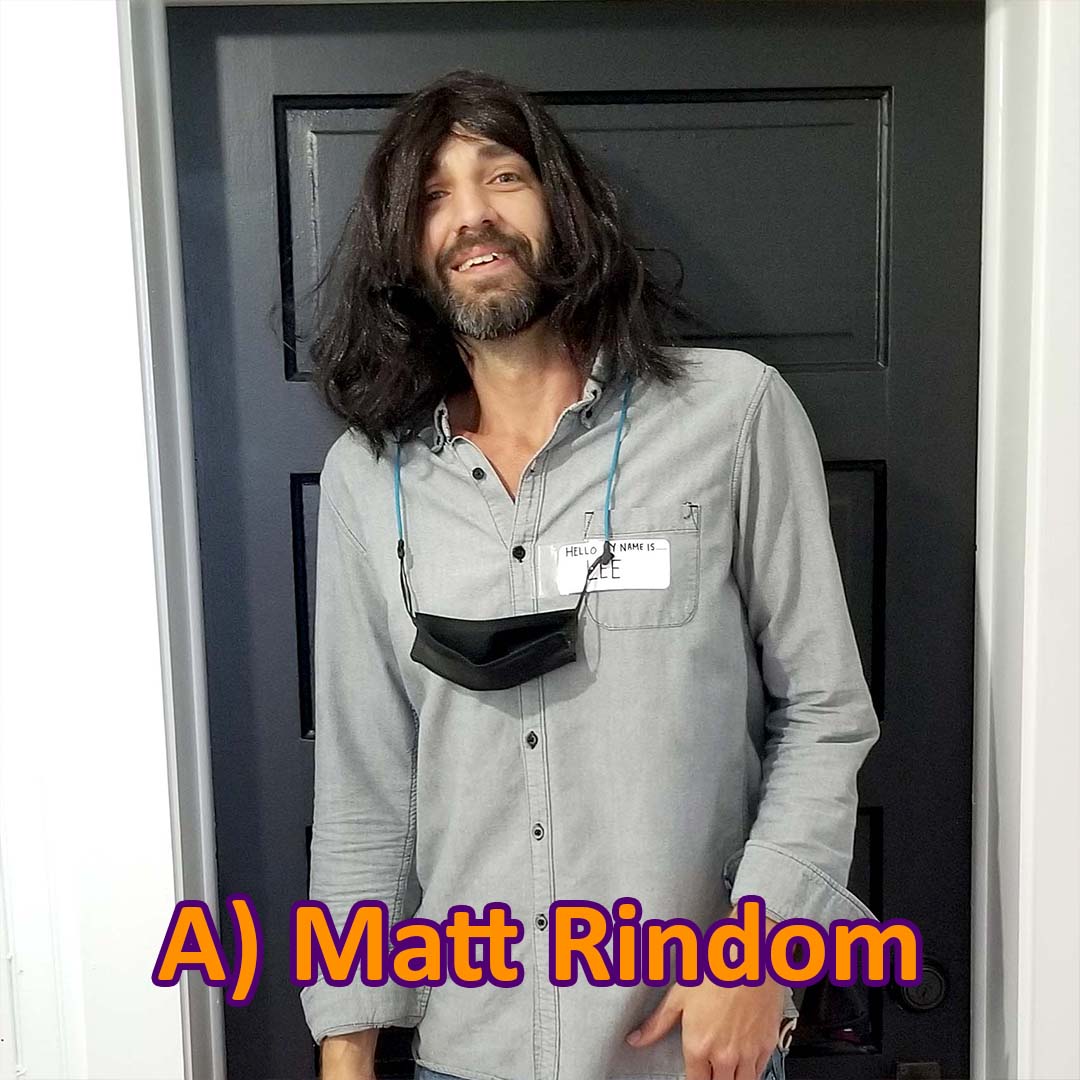 Insurance Agent Matt Rindom dressed as Insurance Agent Lee Wiglesworth in front of a black door