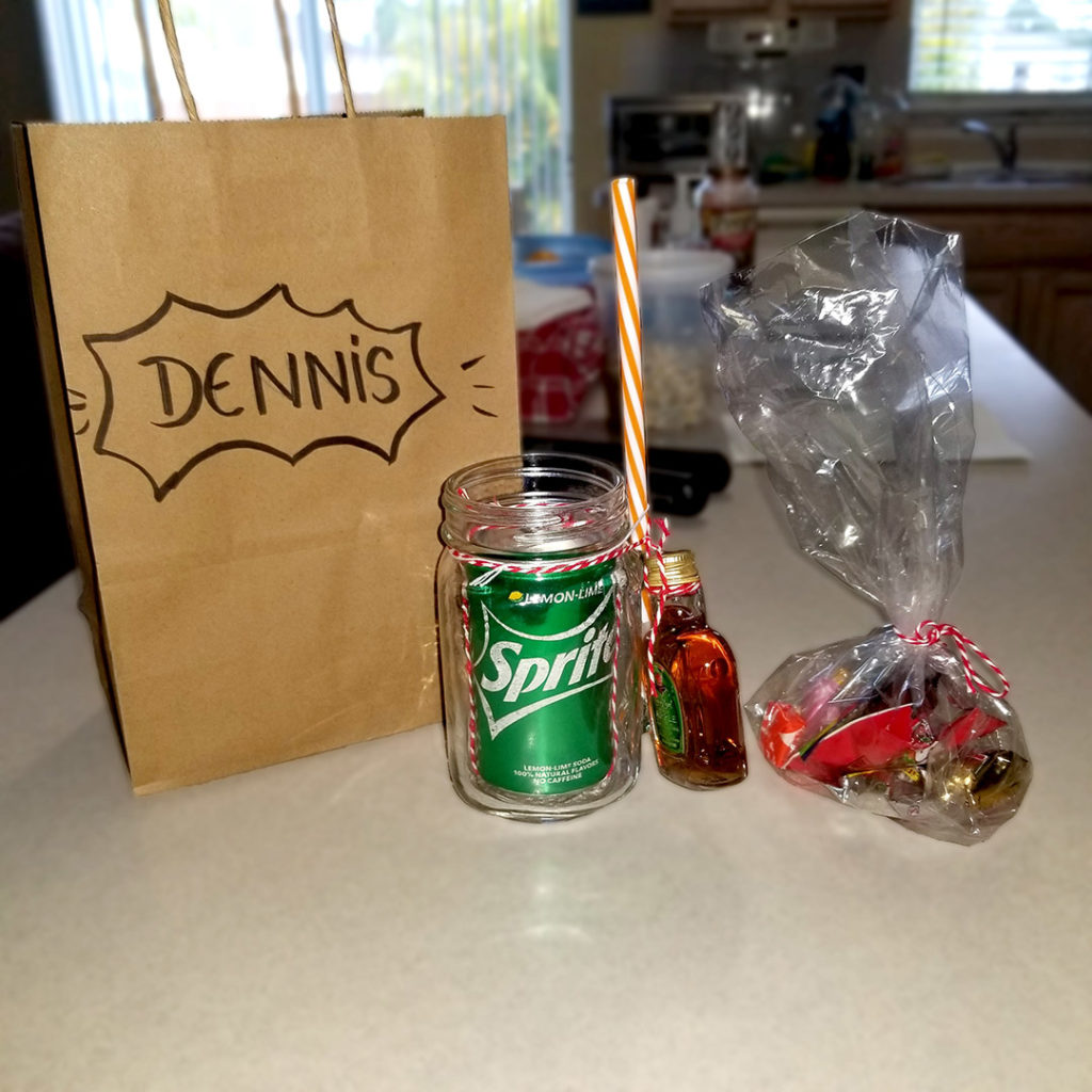Dennis thank you kit with mason jar, bag, soda, and alcohol