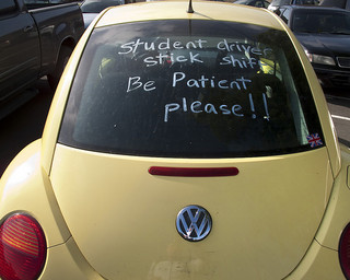 Volkswagon buggy with writing on the back of the car