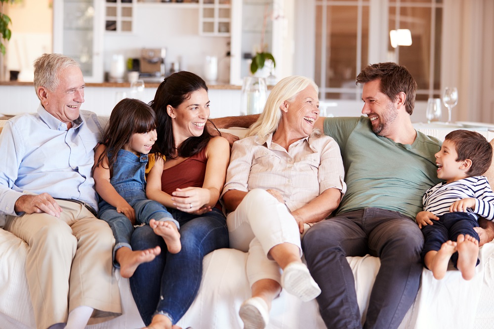 family gathered on couch